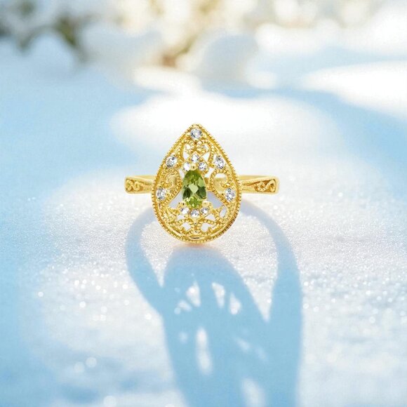 Jewelry - Peridot and White Topaz Ring in Yellow Gold Plated 925 Sterling Silver